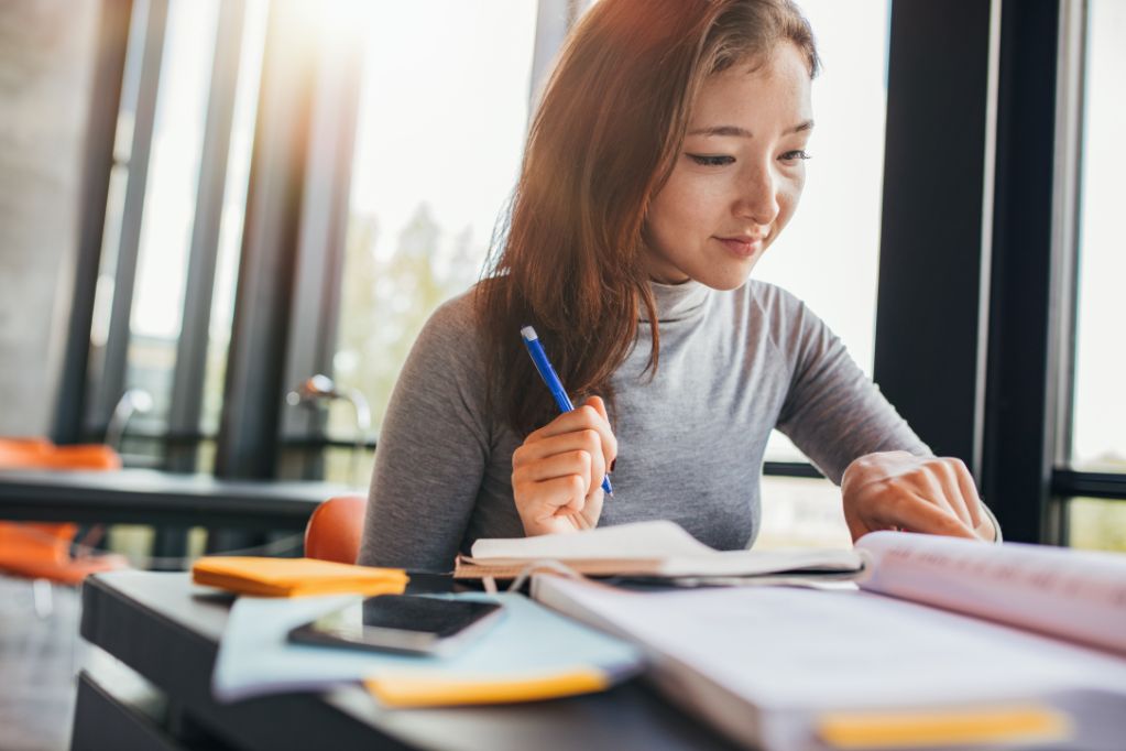 Practise writing essay outlines during JC Economics tuition